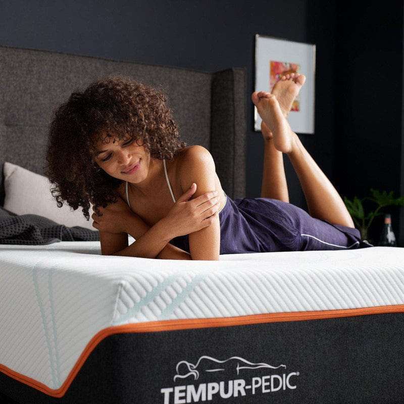 king-size-mattress with woman laying down