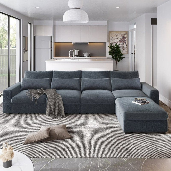 Living room furniture- A Blue Sectional sofa with a chaise in a living room 