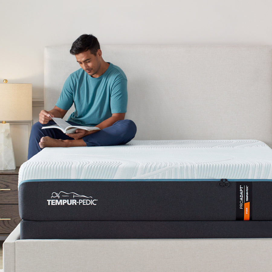 tempur-pedic-pro-adapt-mattress-with-man-sitting