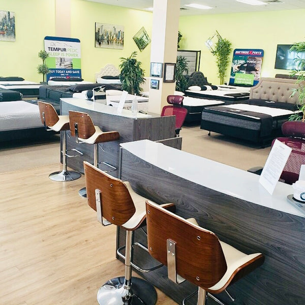 front-desk-delray-mattress-xperts-mattress-collection-inside-store